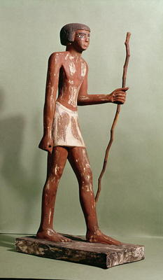 Model of an official (painted wood) from Old Kingdom Egyptian