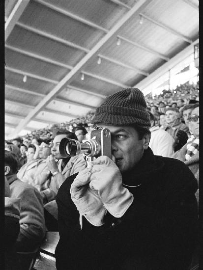 Tony Curtis with Leica camera at the Winter Olympics, Squaw Valley, California
