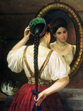 A girl at the mirror