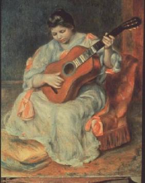 Frau, auf einer Gitarre spielend