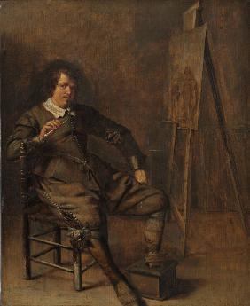 Portrait of a painter in front of his easel