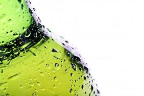 beer bottle with water droplets isolated