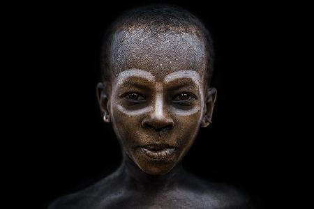 Junge vom Mursi-Stamm SIYP,Südäthiopien