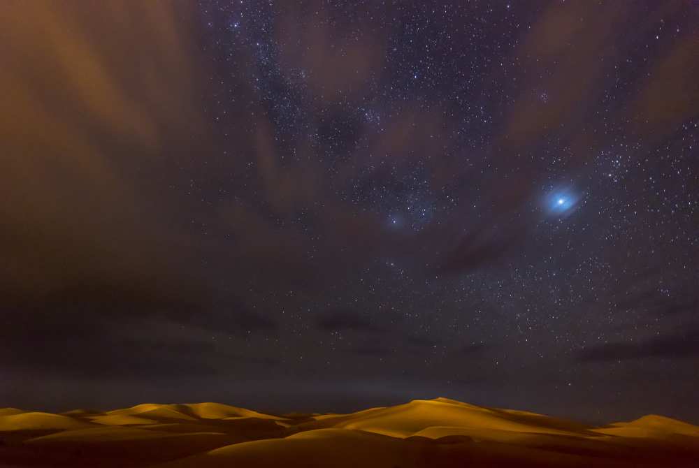 Stars, Dunes and Clouds in Marzuga Desert from Tristan Shu