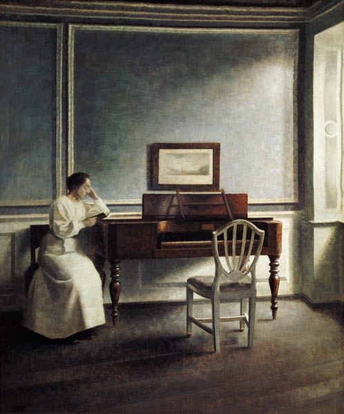 Frau, neben einem Klavier in einem Buch lesend. from Vilhelm Hammershoi