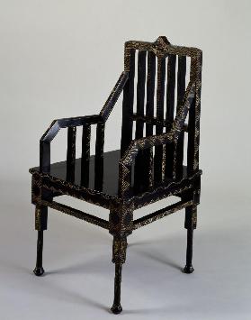 Wooden art deco chair with a gold arabesque decorations on a black background