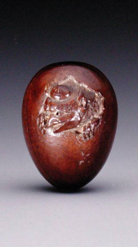 Netsuke depicting a crow emerging from its egg from Yuzan